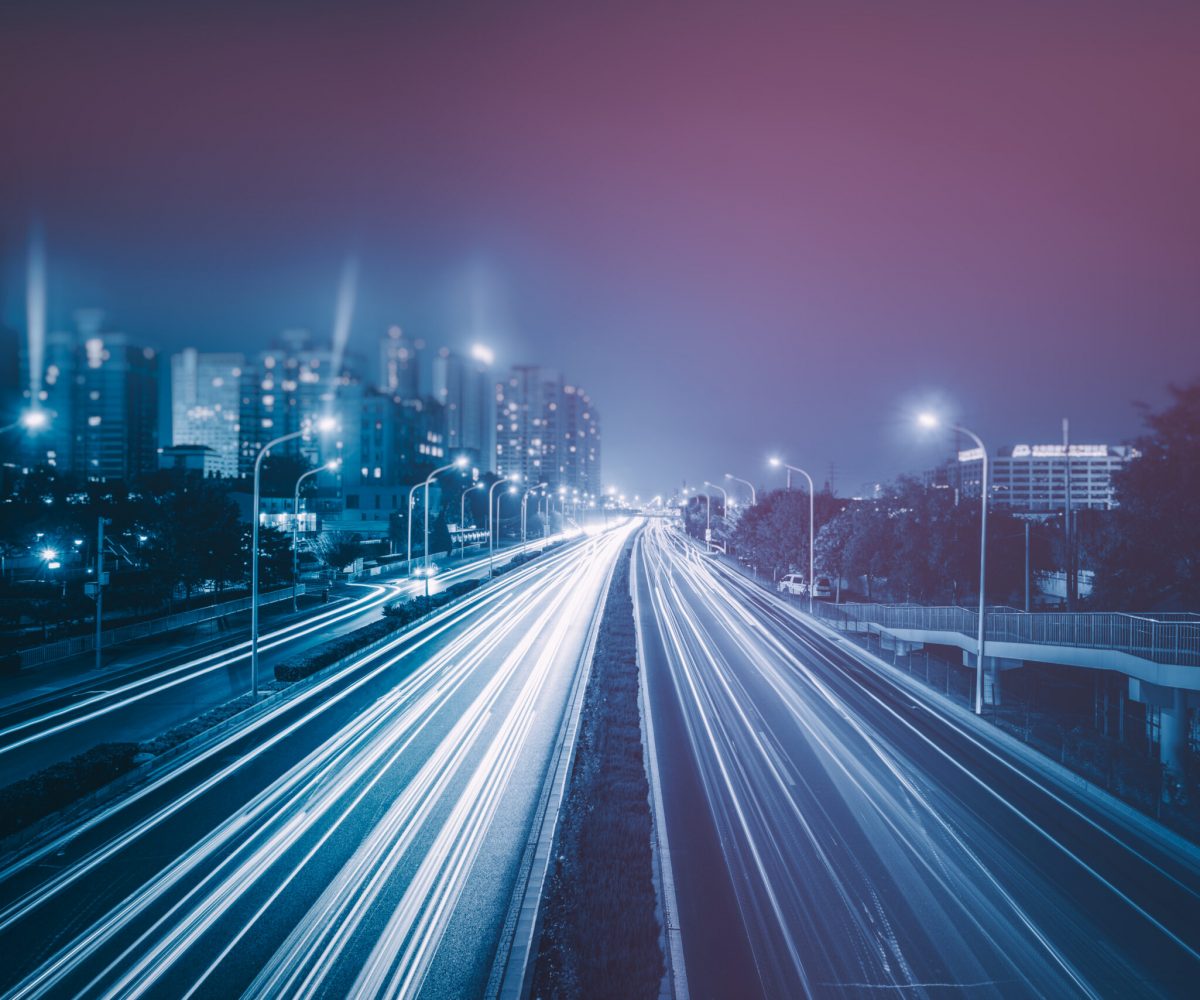 blurred traffic light trails on road in Beijing,China.